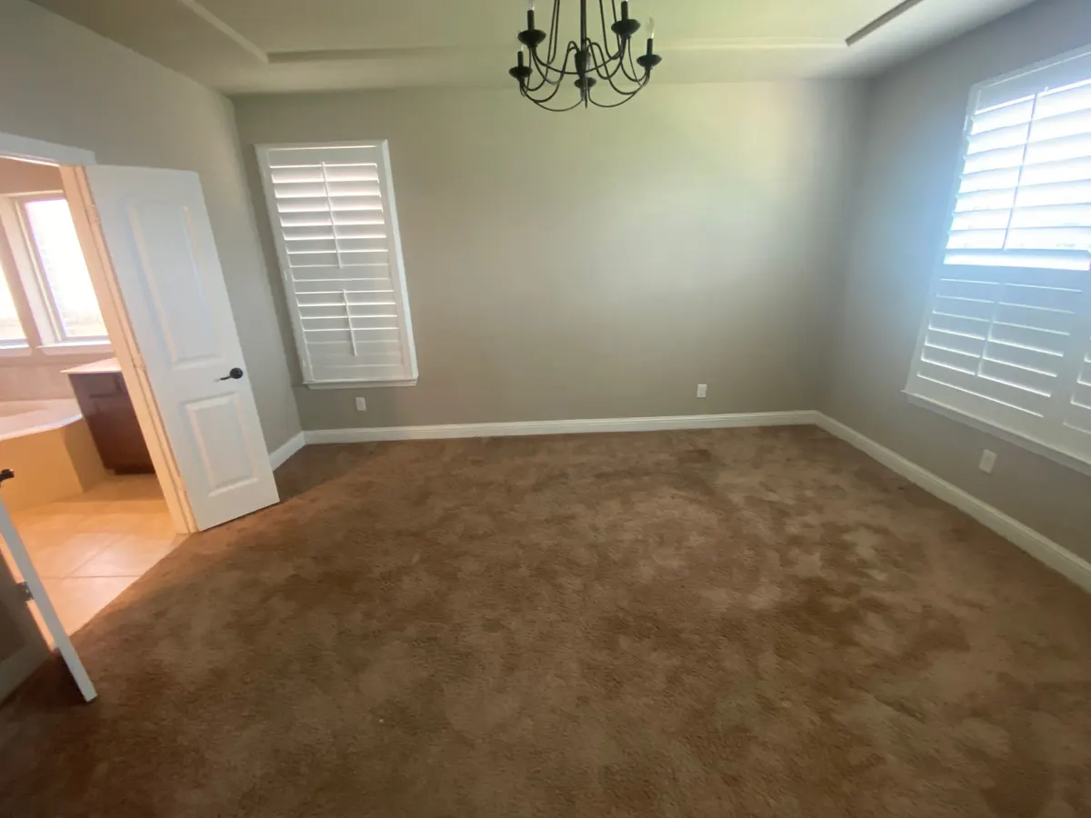 Dining room at 1025 Spring Falls before make-ready close-out